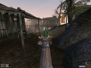 Morrowind screenshot of my character in Kuul. I'm wearing a glass helmet and some enchanted robes.